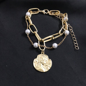 Coin pearl shackle bracelet