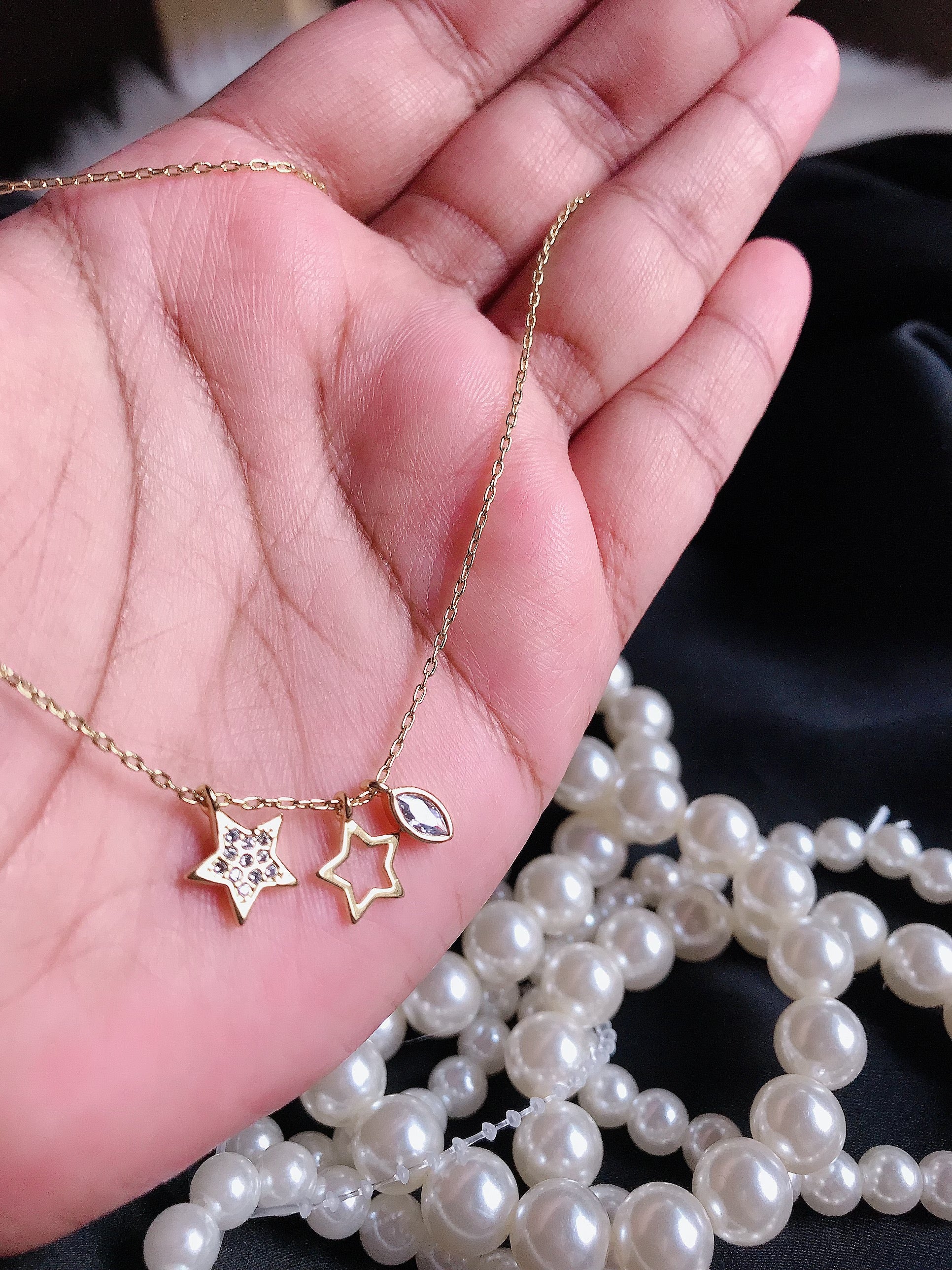 Golden double star stone pendant