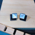 Load image into Gallery viewer, B &amp; W enamel Triangle Earrings
