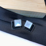 Load image into Gallery viewer, B &amp; W enamel Triangle Earrings
